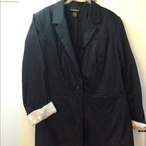 Black blazer with cuff detail.