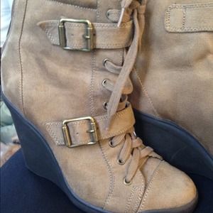 Tan suede sneaker wedge boots.