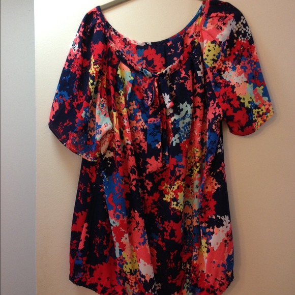 Bright floral top with tie front detail.
