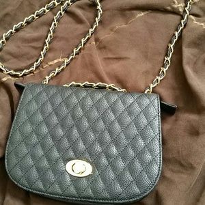 Black quilted and gold chain purse