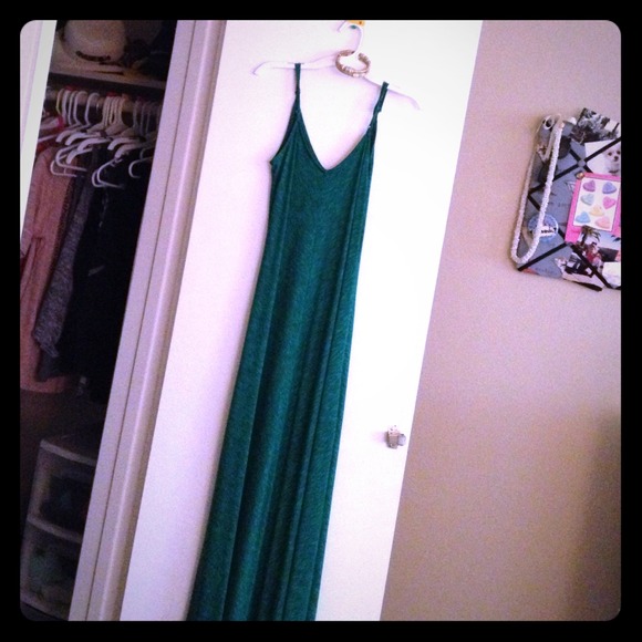 Emerald maxi dress with arm bangle