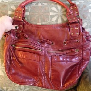 Purse brick red leather look..shoulder size strap.