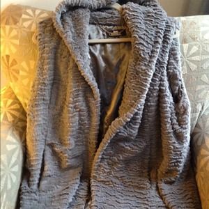 Grey faux fur hooded vest. Dennis Basso.