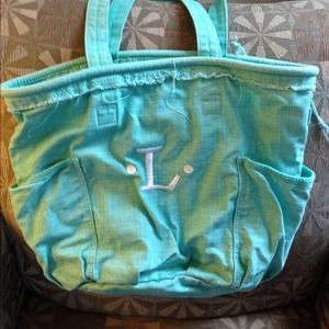 Thirty one retro metro real bag with L monogram.