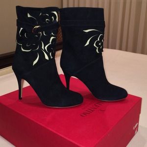 Valentino suede booties with floral cut outs.