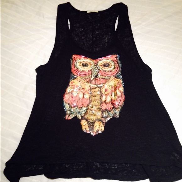Long racer back style beaded tank top.