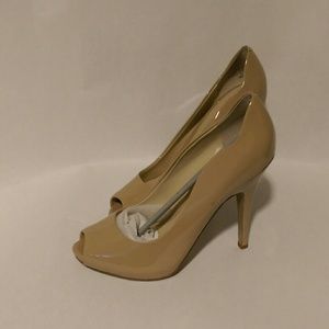 Nude peeptoe pumps