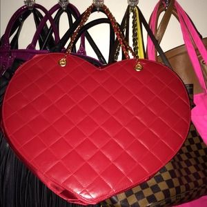 Brand new quilted heart shaped purse