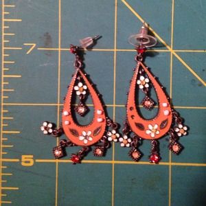 Orange earrings with charms