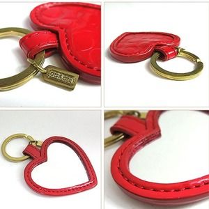 Coach's red heart mirror keychain