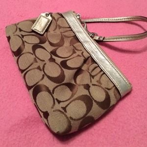 Metallic classic coach wristlet Metallic classic coach wristlet
