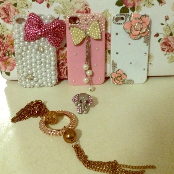 3 iPhone 4 cases and complementary ring& necklace.