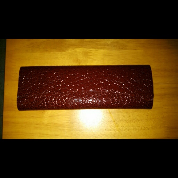 Burgundy snakeskin clutch