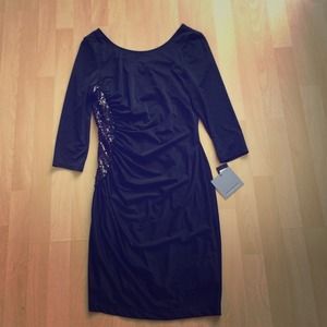 Ruched black cocktail dress with sequin details