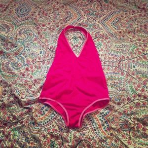 Hot pink American Apparel bodysuit.