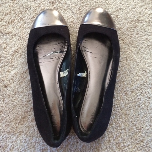 Black ballet flats with silver toe