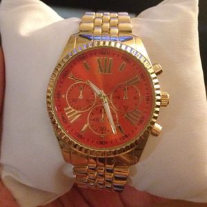 Gold and orange watch