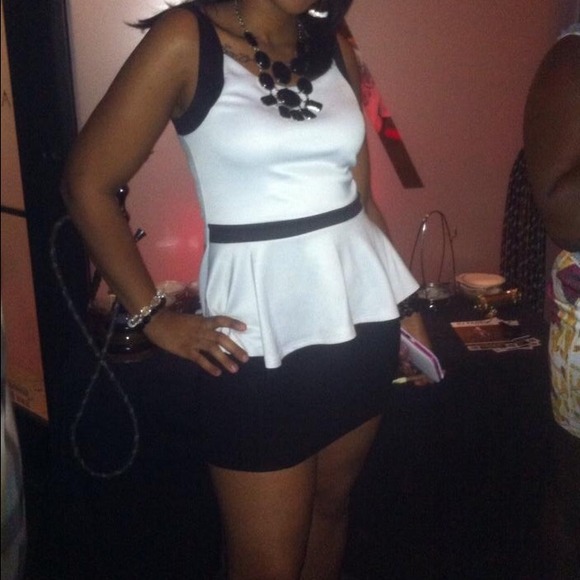 White peplum top with black outlines
