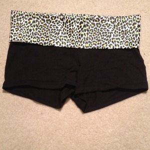 Black spandex with cheetah top