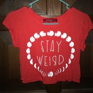 "Stay weird" red crop top.