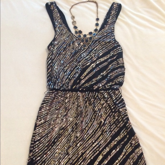 Black dress with gold and silver sequins