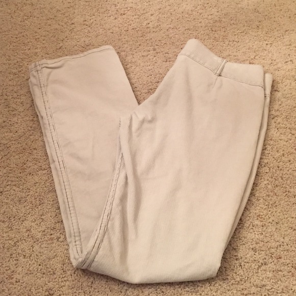 Corduroy pants with wide banded waist and snaps.