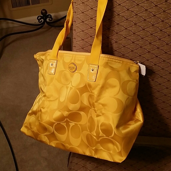 **Hold for Genesia**Coach Weekender **Authentic**