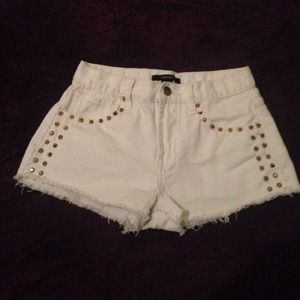 White high-waisted shorts w/gold studs