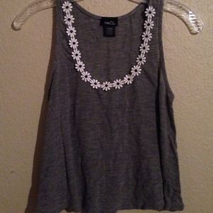 Loose fit grey tank top with white daisy accent
