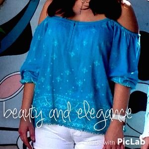 Francesca's blue off shoulder shirt