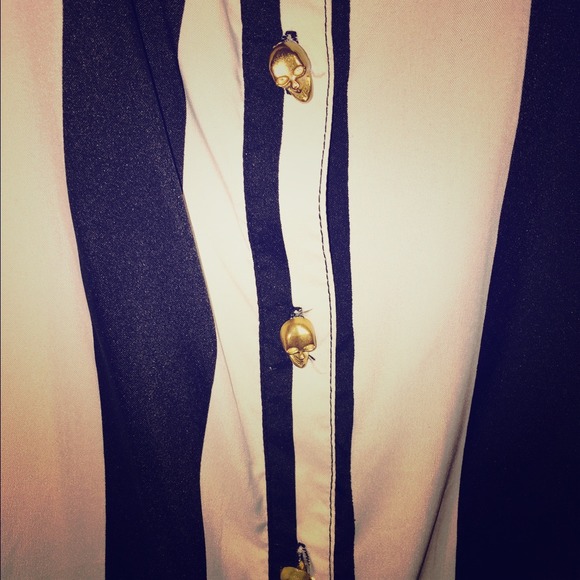 Black and white shirt with gold skull buttons