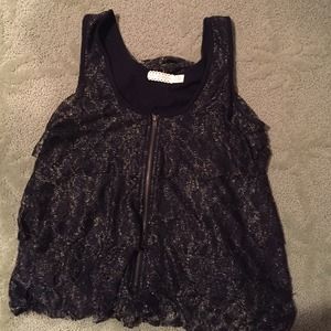 Black and gold sleeveless shirt