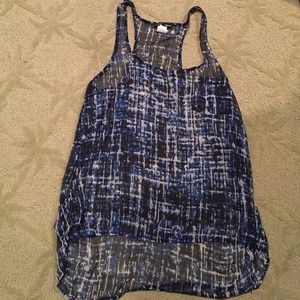 Blue and white sleeveless blouse
