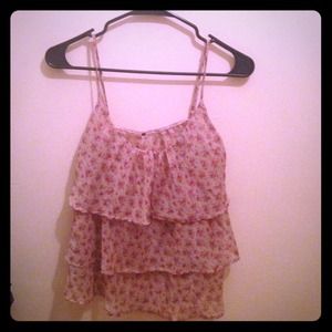 Ruffled flower spaghetti strap .