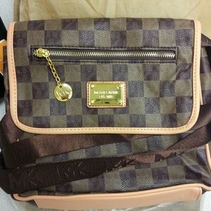 Inspired M. K.  Cross body swing bag new