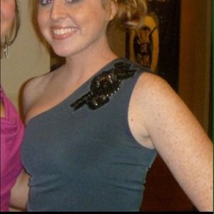 One shoulder top with beaded embellishments