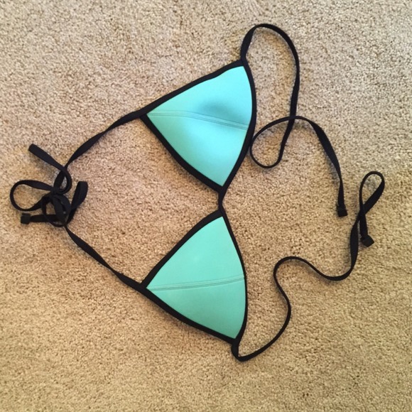 Small blue triangl top