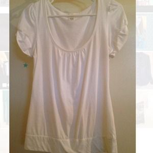 Plain white T-Shirt, a little ruffled sleeves.