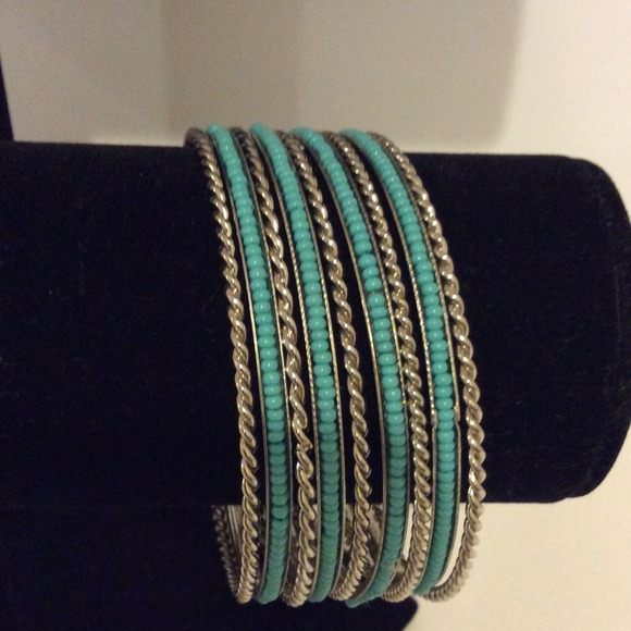 Set of 9 stackable bangles silver and turq beads