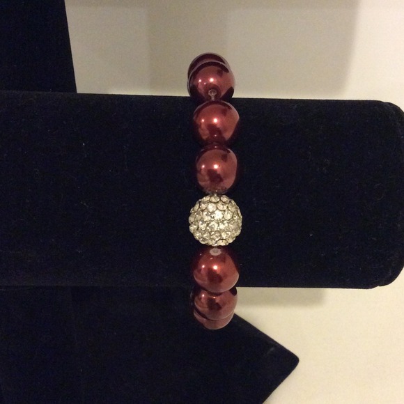 Red beaded bracelet with single pave circle