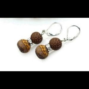 Jilzara Animal and Rhinestone Earrings.