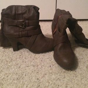 Heeled boots. NEVER WORN.