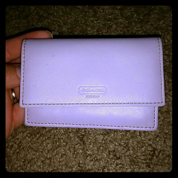 Lavender/white COACH leather card case.
