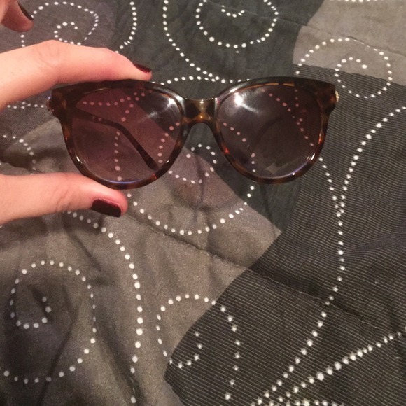 Brown and gold sunglasses
