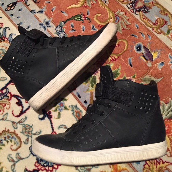 Black laced with velcro high top shoes