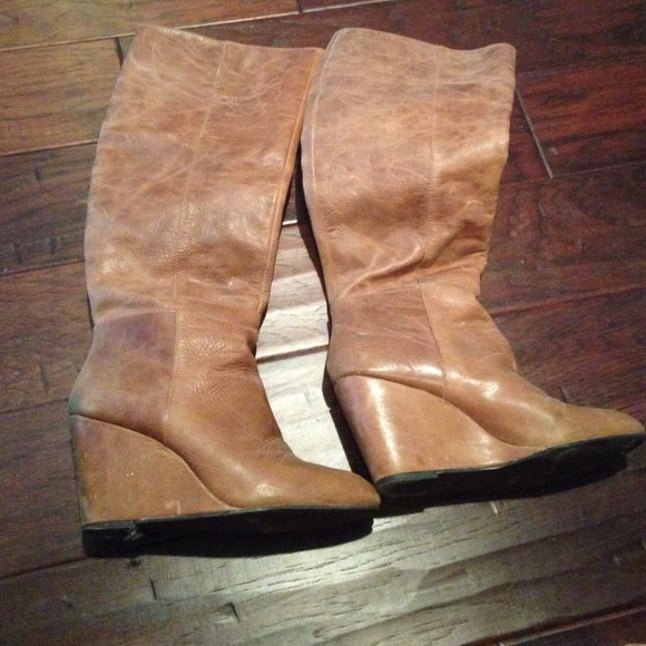 Wedged knee length boots