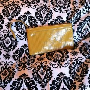 Mustard yellow wristlet clutch