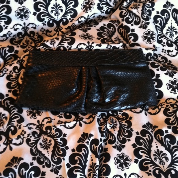 Black snakeskin clutch