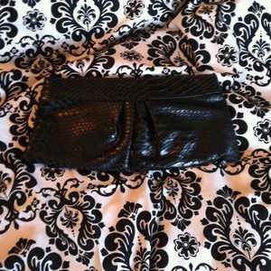 Black snakeskin clutch