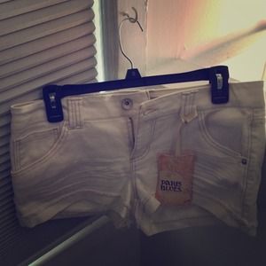 Paris Blues white denim shorts.